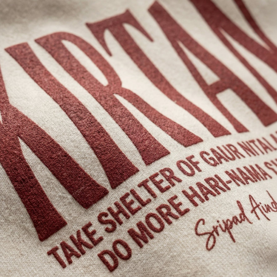 Beige hoodie with red text on a beige background