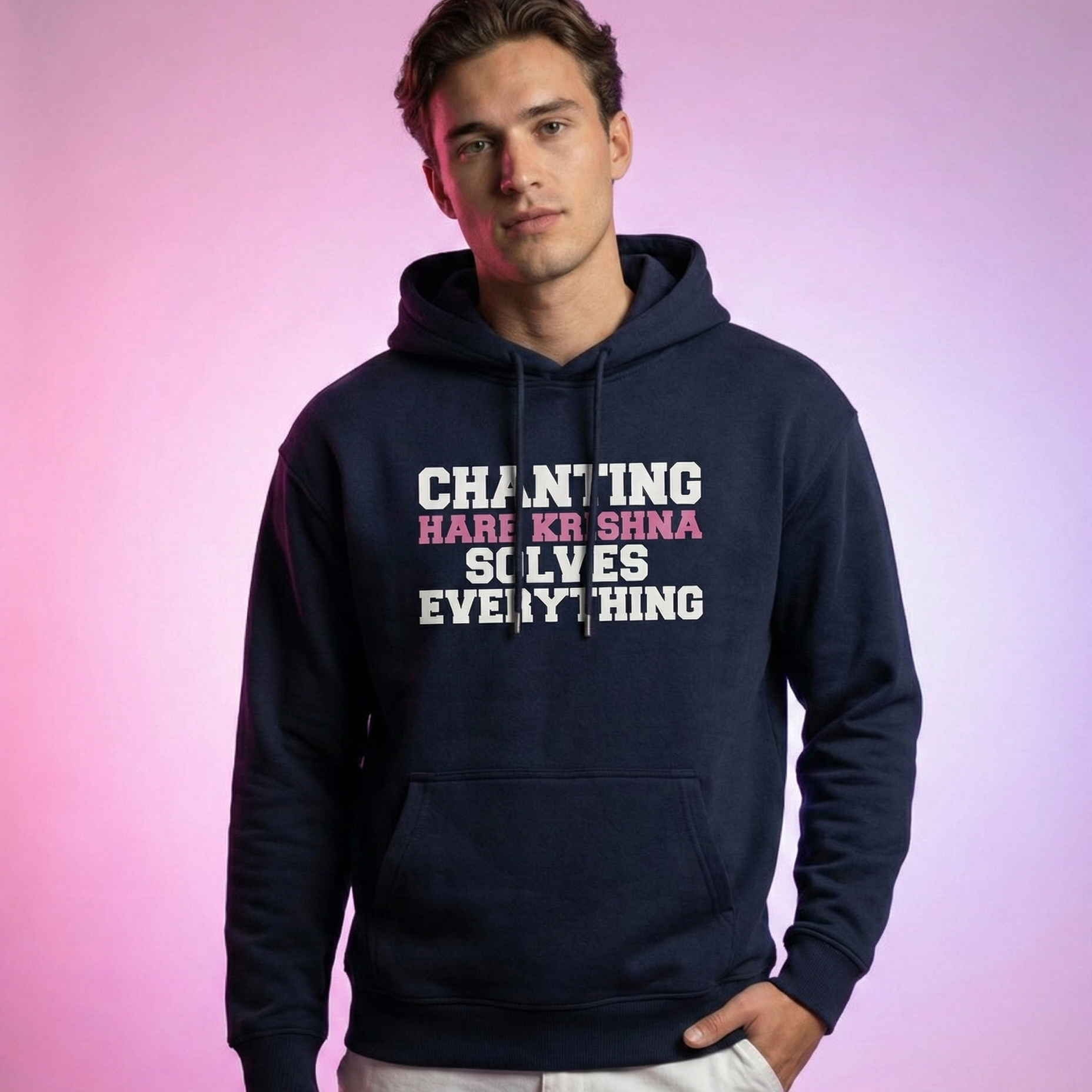 Person wearing a navy hoodie with text on a pink gradient background